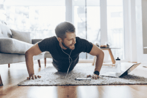 Young man doing push ups and working out as one of the 5 ways to crush crystal meth cravings