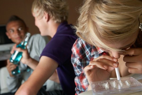 Teen girl snorting coke