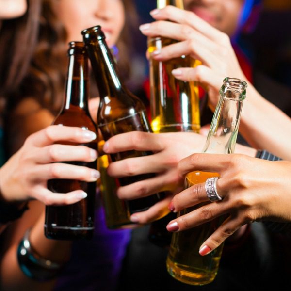 Women toasting beers