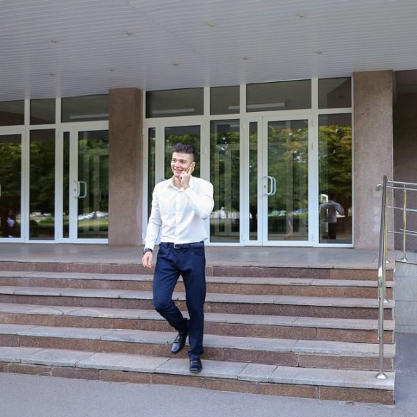 Young man leaving facility