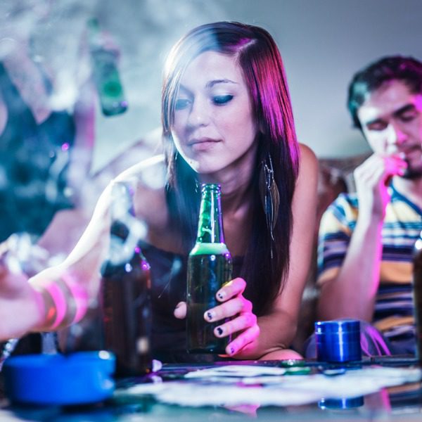 Woman compulsively drinking