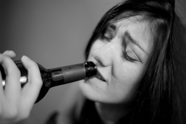 Woman drinking beer