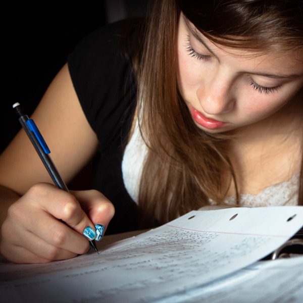 Young woman making notes