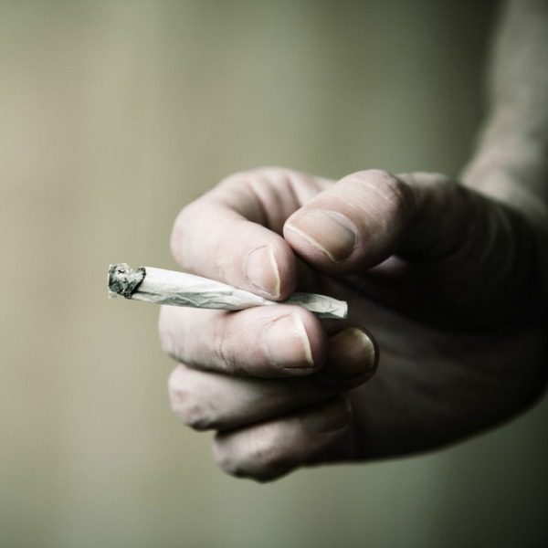 Man holding joint