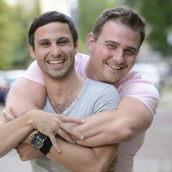 Gay couple hugging