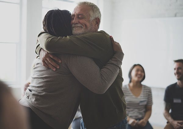 Counseling group hug