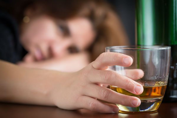 Woman with liquor glass