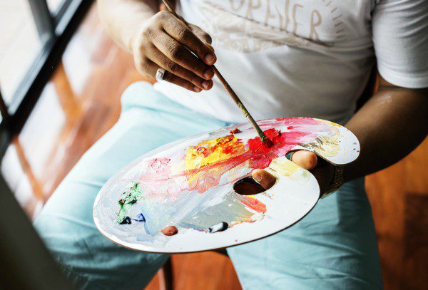 Artist mixing colors