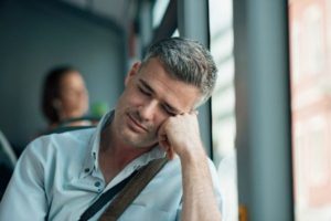 Sleepy man on bus