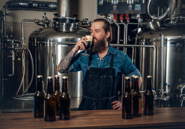Brewmaster tasting beer