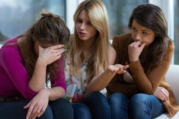 Women holding intervention with friend