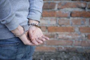 man's hands in handcuff's