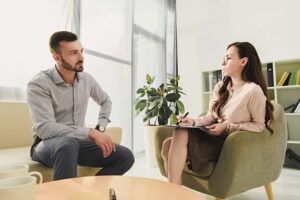 two people work together in a marijuana detox center