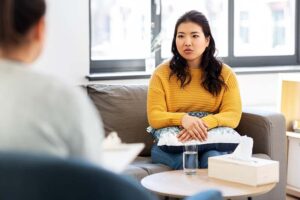 a woman works through issues in an opiate detox center