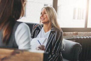 a woman directs a sober living program