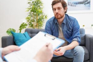 a man learns about a marijuana addiction treatment program