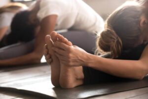 people participate in a yoga therapy program for addiction
