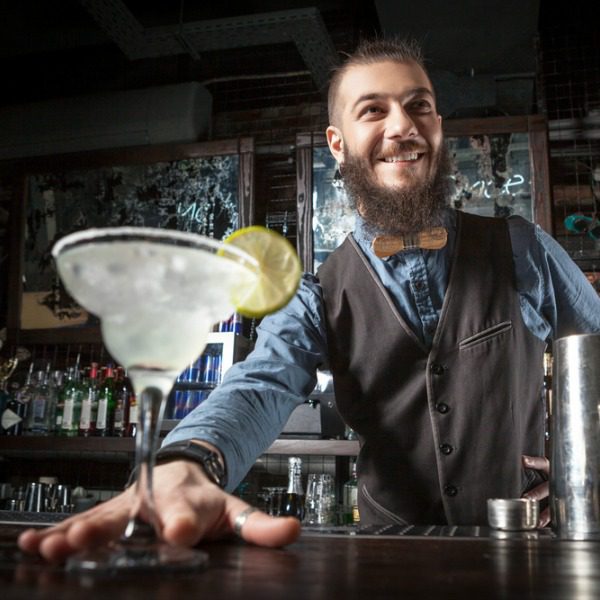 Bartender serving drink