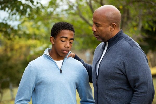 Father talking to son