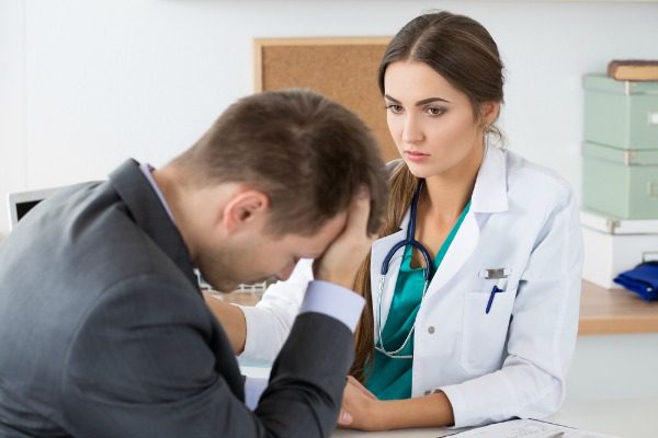 Nurse with distraught patient
