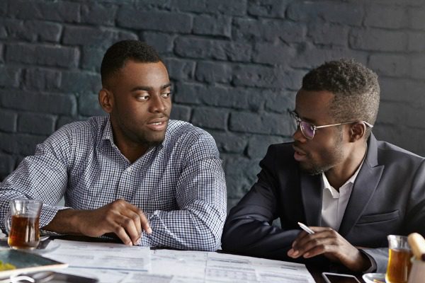 Man talking to boss
